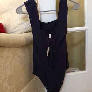 Free people body suit NEVER WORN
